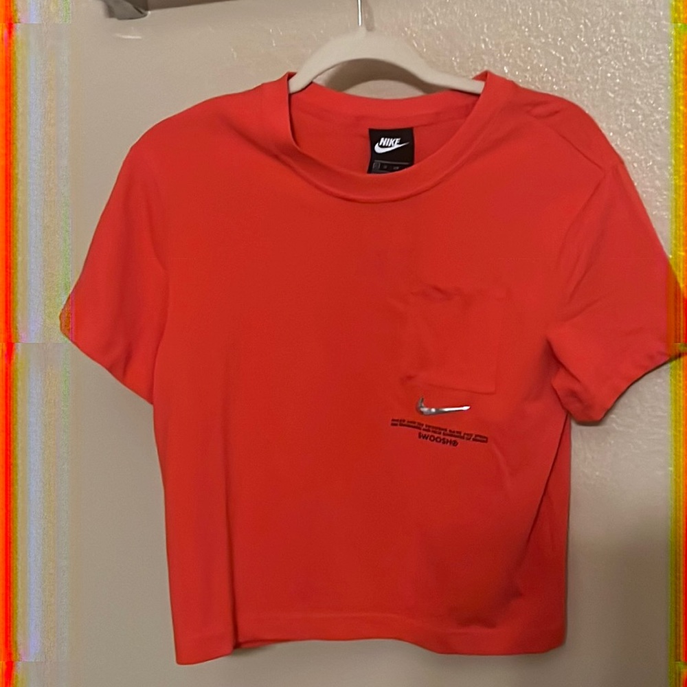 Nike xsmall orange top with pocket!!